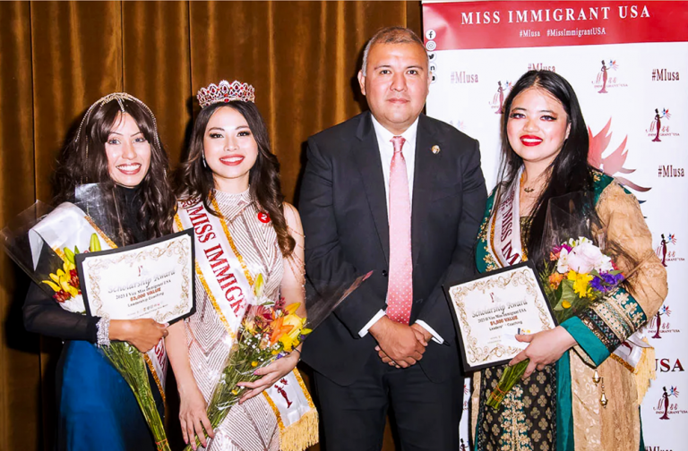 Commissioner of the NYC Mayor's Office of Immigrant Affairs (MOIA), Manuel Castro with Miss Immigrant USA winners
